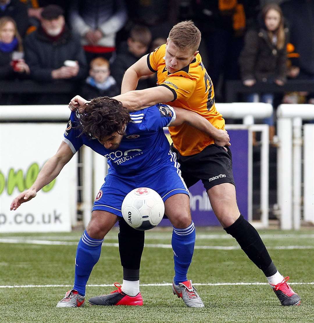 Maidstone United defender Ross Marshall gets to grips with Bradley Goldberg Picture: Sean Aidan