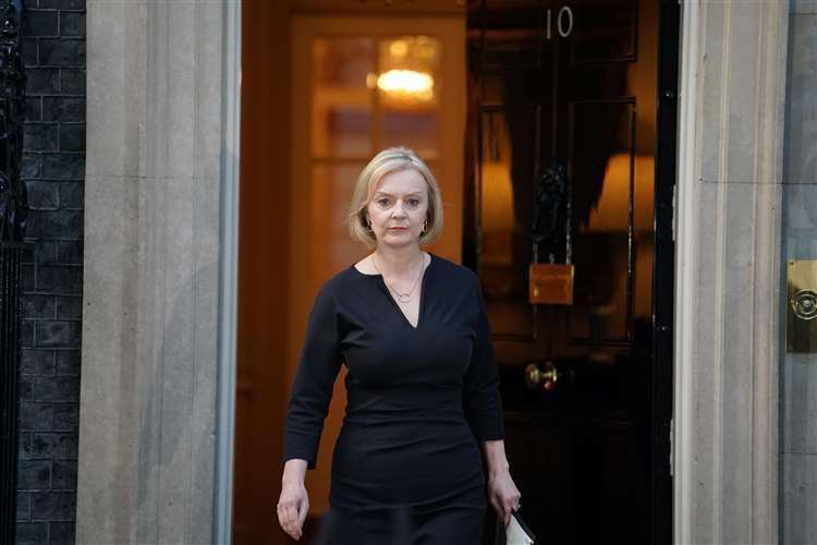 Prime Minister Liz Truss walks from the door of 10 Downing Street. Pic: Dominic Lipinski/PA