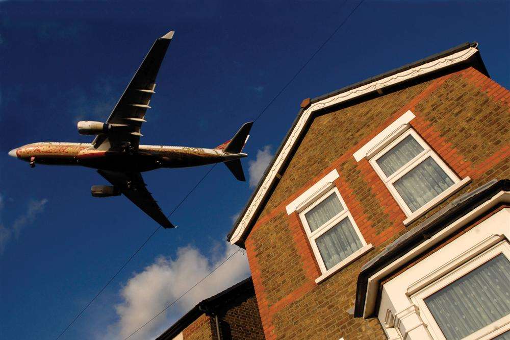 A plane flying over a house in Feltham on its way to land at Heathrow. Picture: Trinity Mirror Southern Ltd