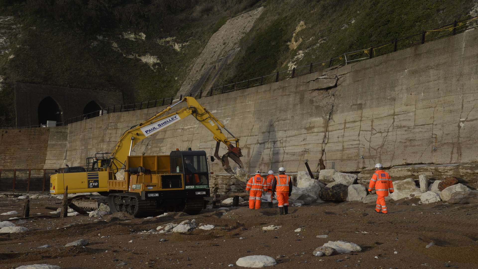 The damaged sea wall and railway embankment between Dover and Folkestone has caused severe disruptions for commuters