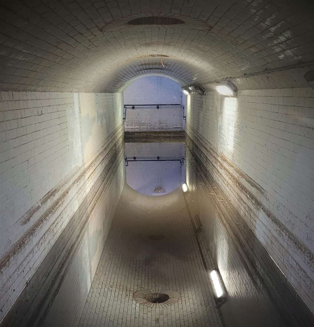 Primary school teacher and photographer Jamie Pickles captured this artistic photo of flooding in the underpass by Faversham train station. Picture: Jamie Pickles