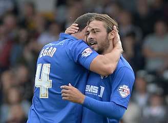Bradley Dack is congratulated by John Egan on his goal at Vale Picture: Andy Payton