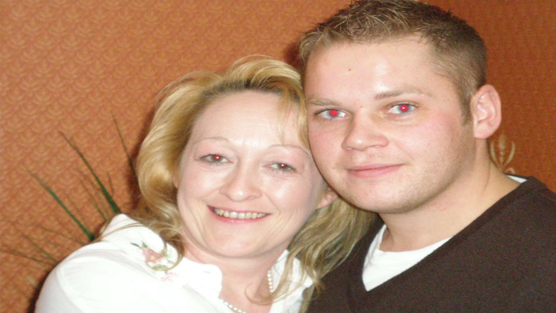 Anne Tribe, pictured with her nephew, Grant, took her own life because of the stress of work, an inquest heard