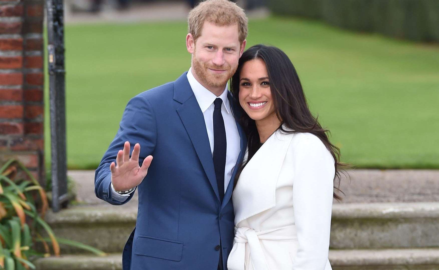 Prince Harry and Meghan Markle in the Sunken Garden at Kensington Palace after the announcement of their engagement. Picture: Eddie Mulholland/Daily Telegraph/PA Wire