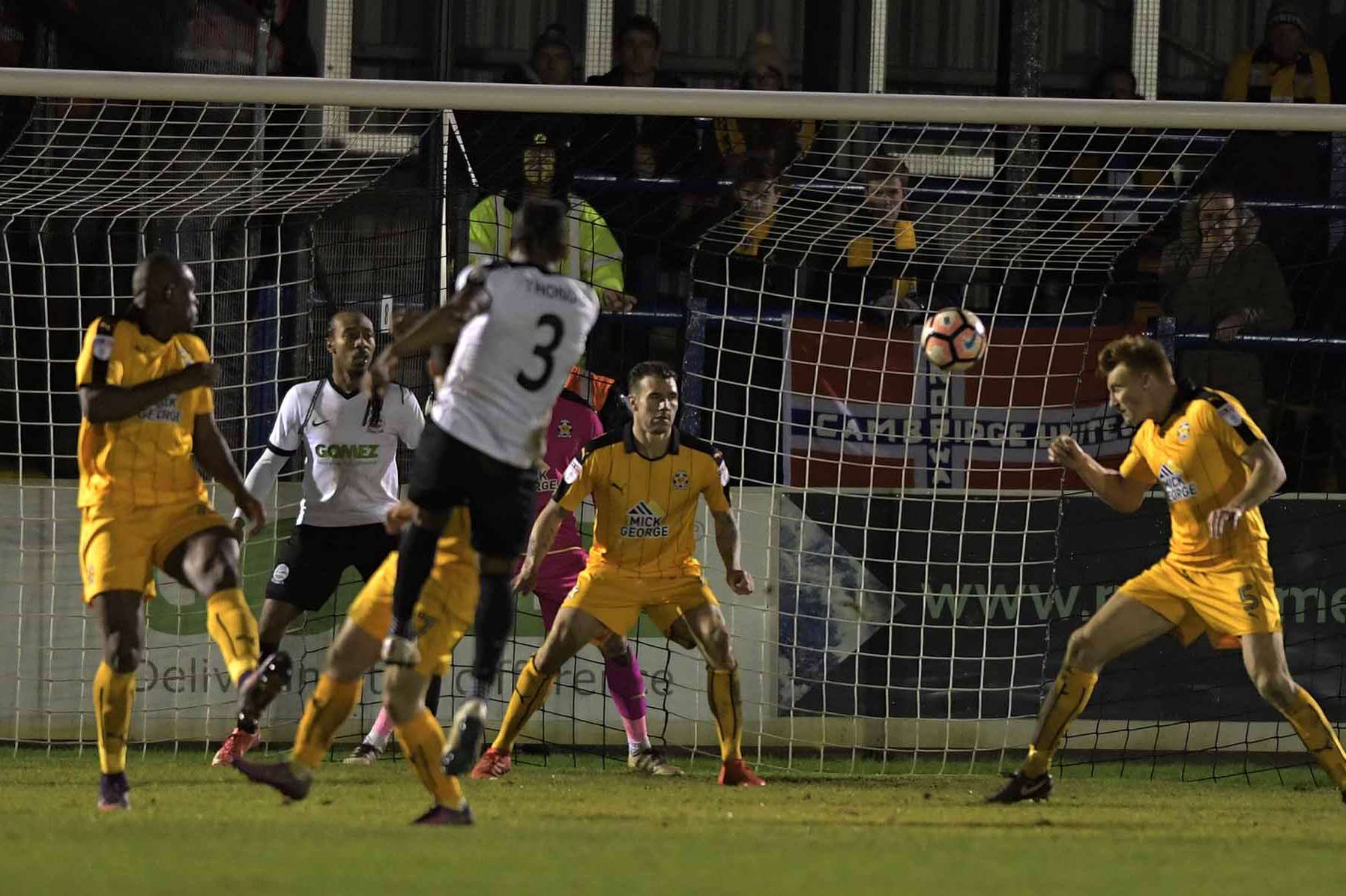 Dover bowed out despite Aswad Thomas' stunning volley, pictured by Barry Goodwin.