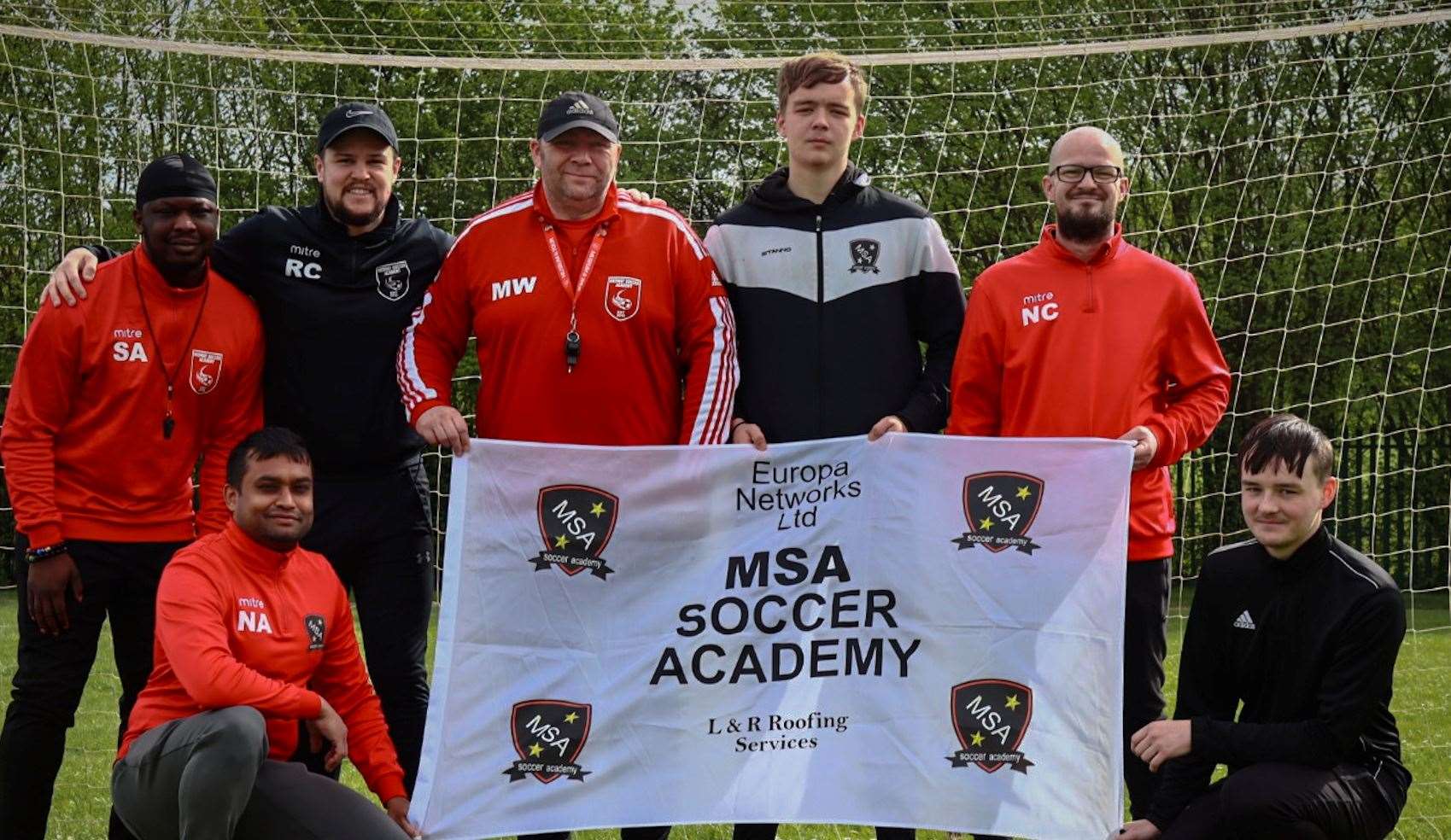 Matt Waters (centre) with the coaches of Medway Soccer Academy. Picture: Matt Waters