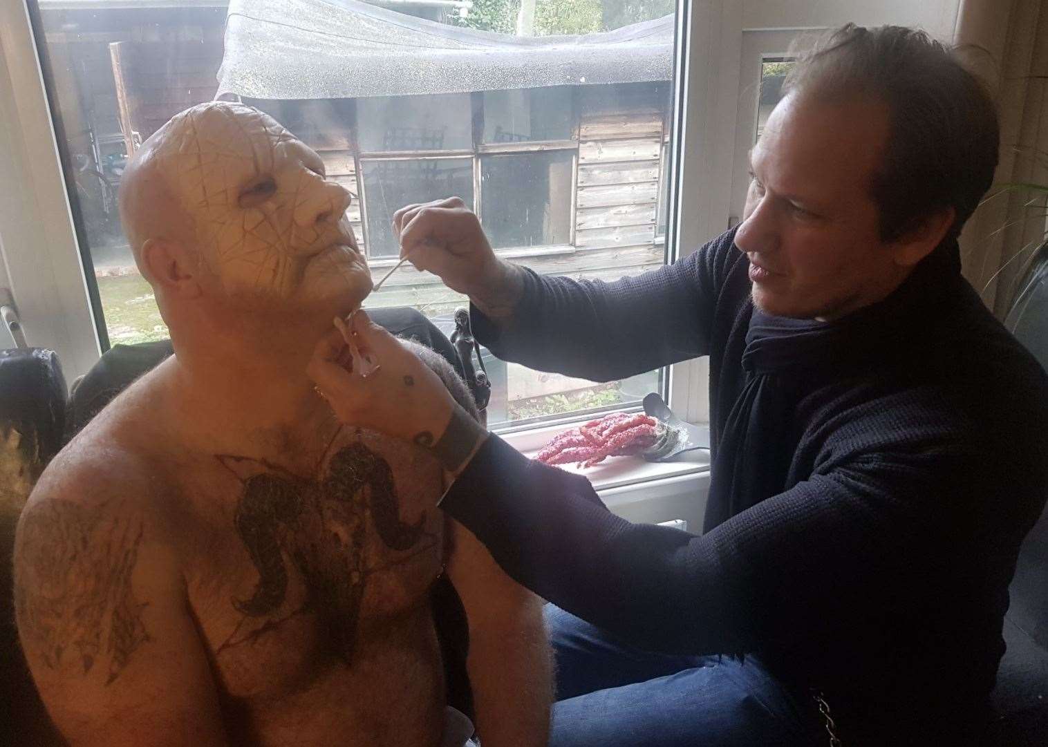 Dave Fox applying prosthetics to Mike Butler. Picture: Chris Nelthorpe
