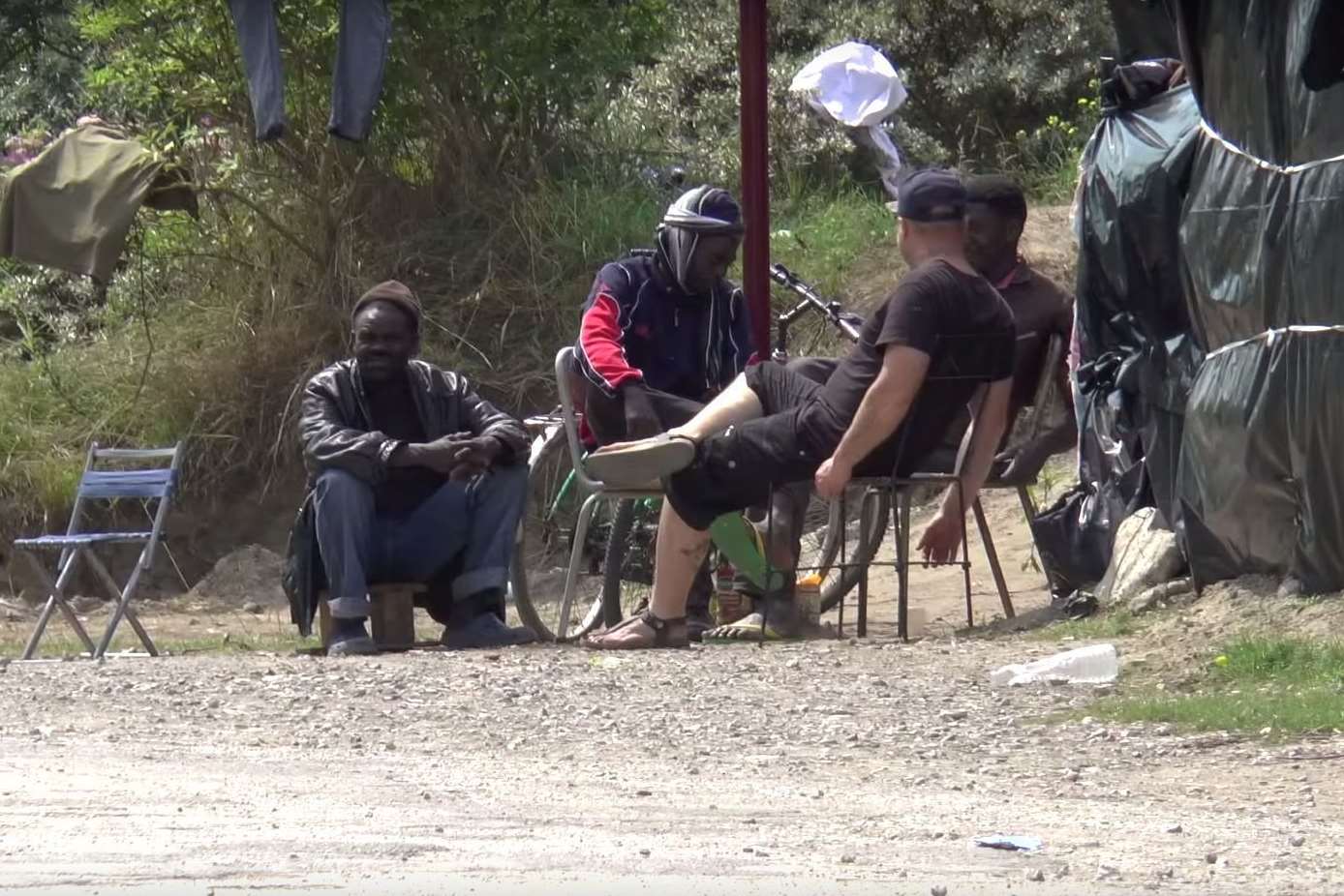 Migrants at the camp in Calais, near the Eurotunnel terminal