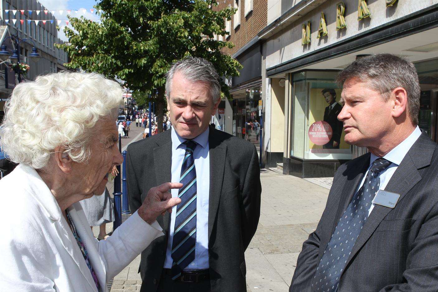 Vera Purll puts her point across to M&S regional manager Marc O'Connor (right) as Messenger editor Bob Bounds looks on