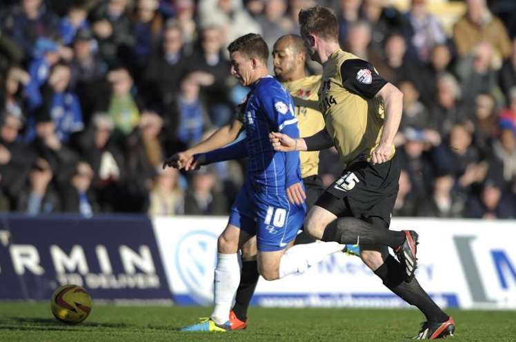 Gillingham forward Cody McDonald breaks through the Leyton Orient defence Picture: Barry Goodwin