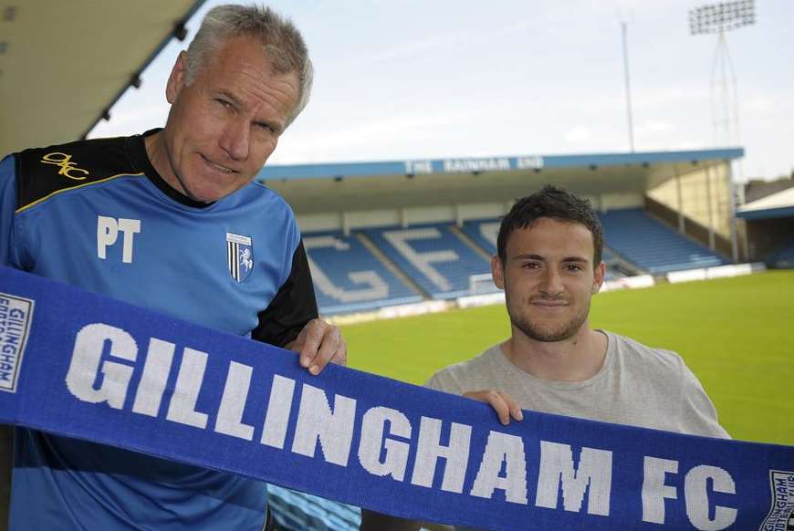New signing Josh Pritchard with Gills boss Peter Taylor. Picture: Barry Goodwin