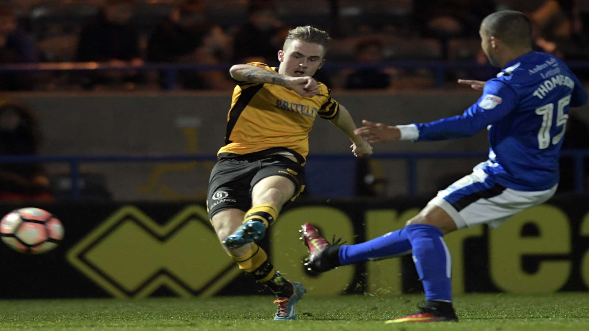 Bobby Joe-Taylor plays the ball forward for Maidstone. Picture: Barry Goodwin