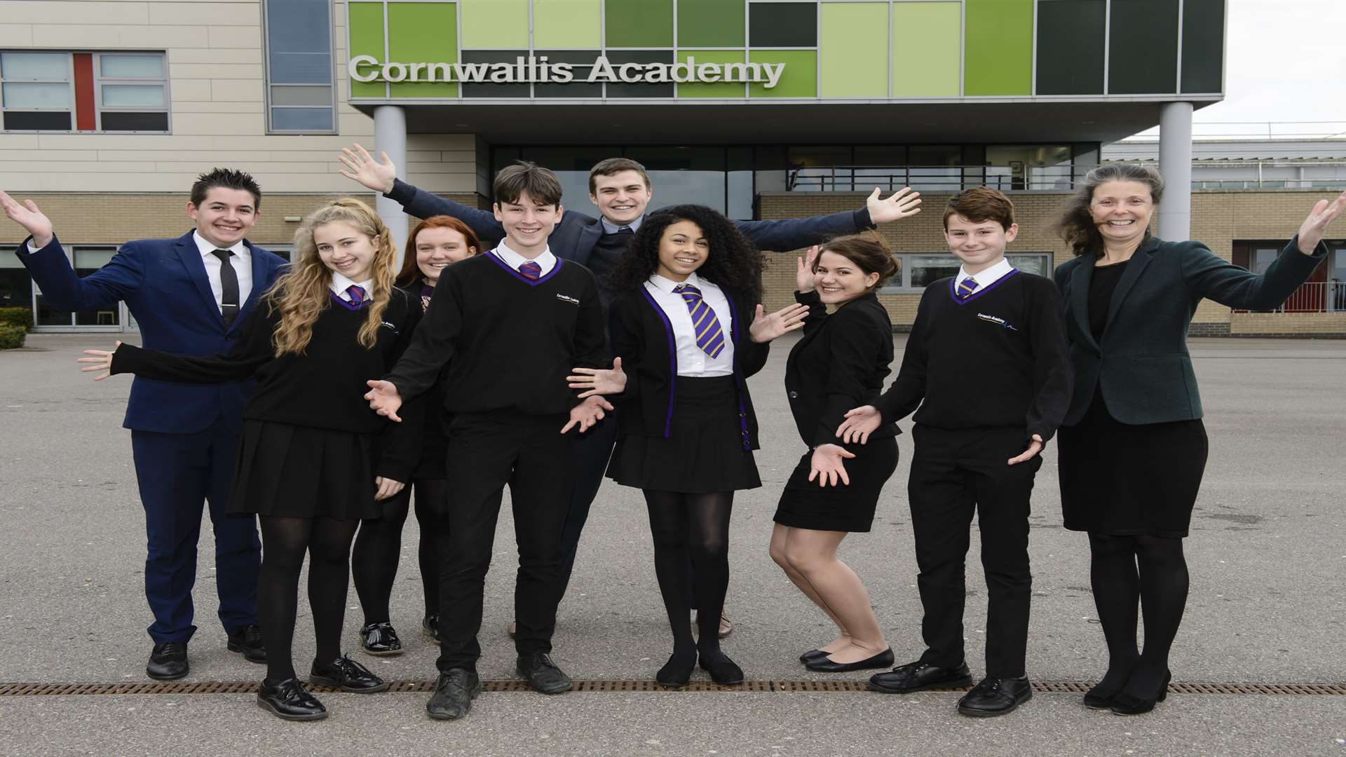 From left, Mason Dadson, 17, Abigail Aldrich, 14, Stacey Wright, 18, Jason Graham, 14, George Watts, 17, Taaliah Carter, 12, Tayla Barry, 17, Finley Smith, 13, and headteacher Isabelle Linney-Drouet. Cornwallis Academy, Hubbards Lane, Maidstone, pleased with their "good" Ofsted report and the achievements of the sixth formers.
