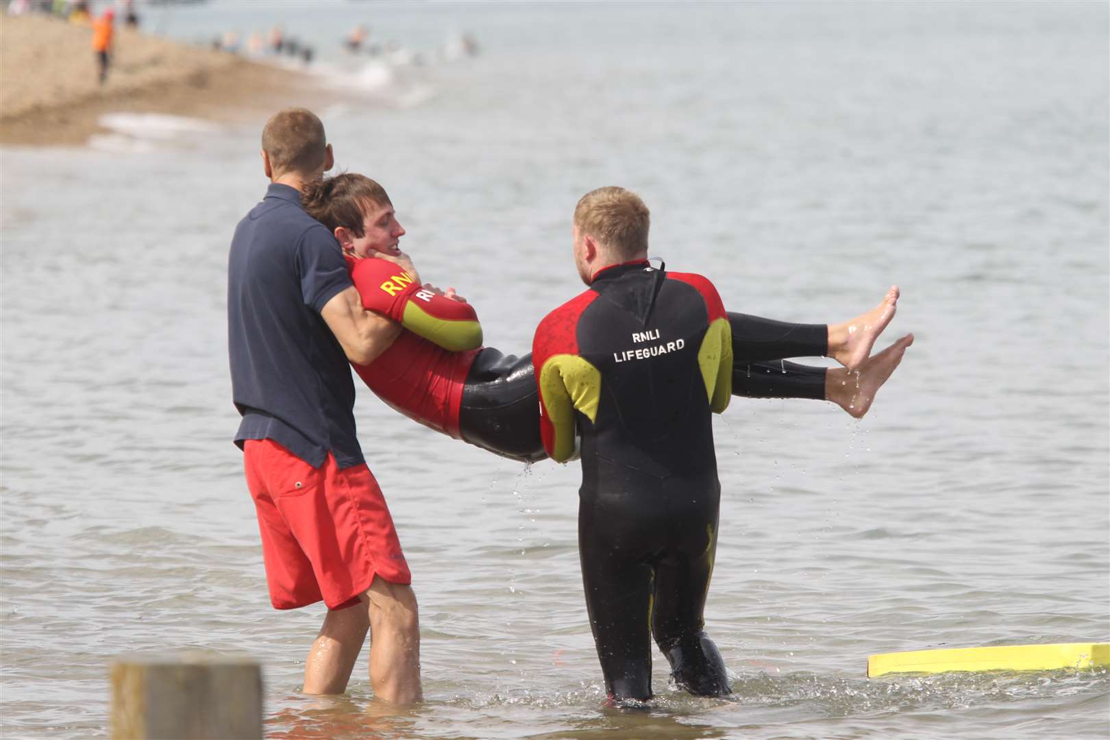 Lifeguards carry out a rescue demonstration at Sheerness bringing a 'victim' out of the water. Picture: John Westhrop