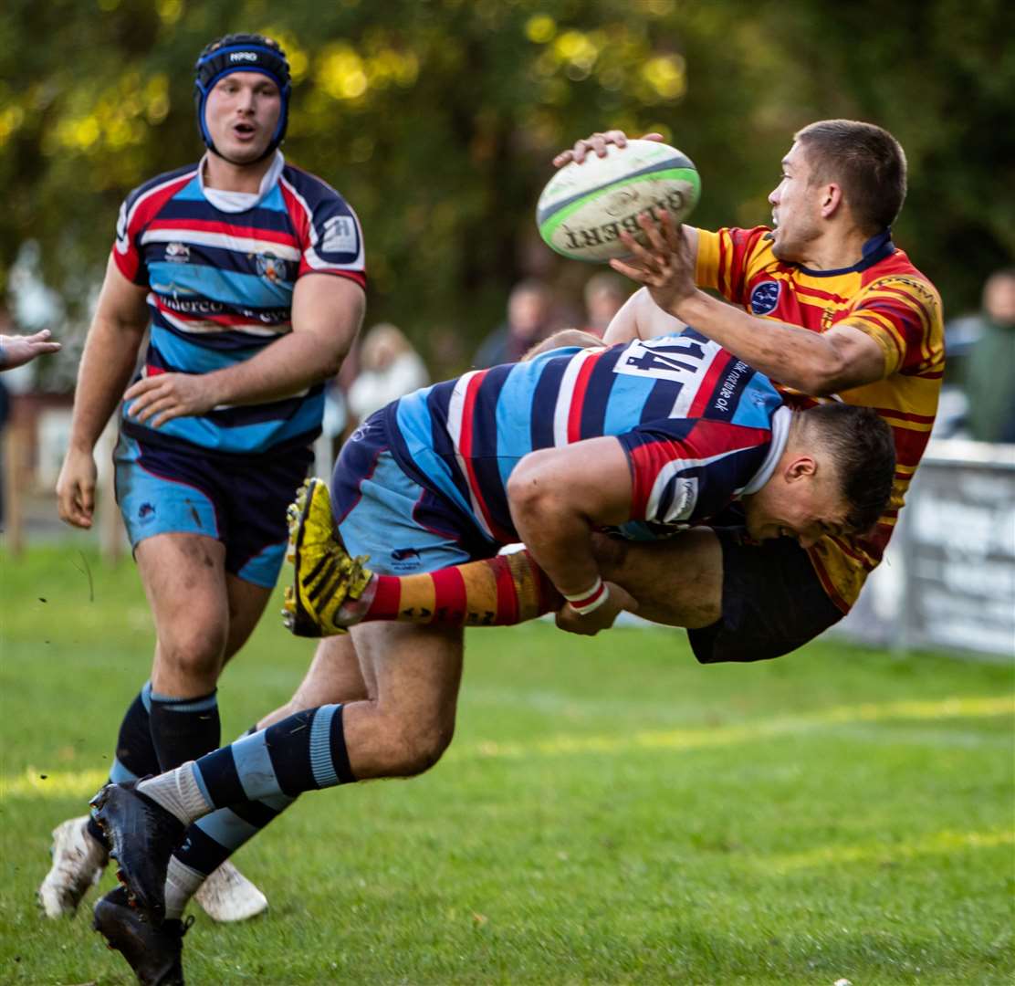 Ben Dance takes a hit for Medway at Reeds Weybridge. Picture: Jake Miles Sports Photography