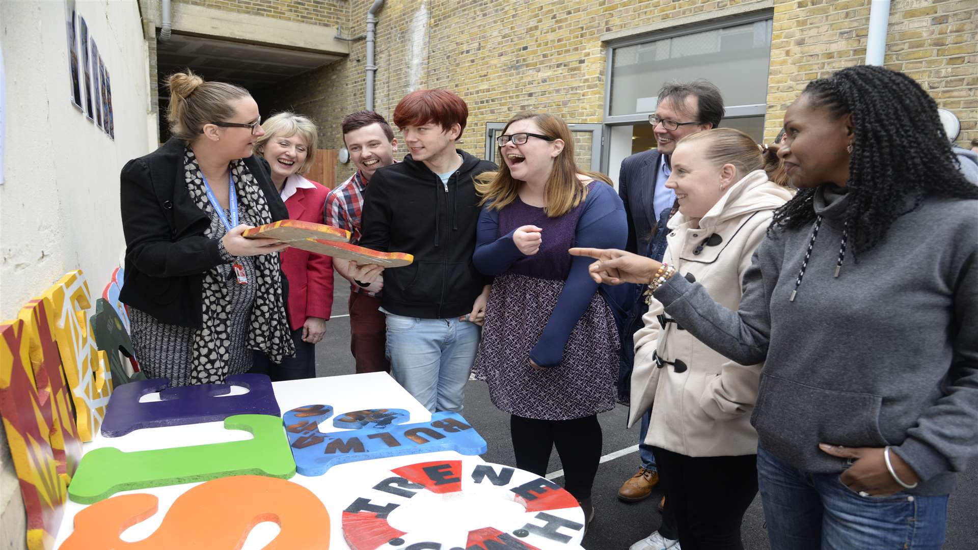 The KCC's Katie Batt and Jane Barber discuss the project with artists and volunteers at the unveiling of the Blank canvass project at the Sheerness Gateway