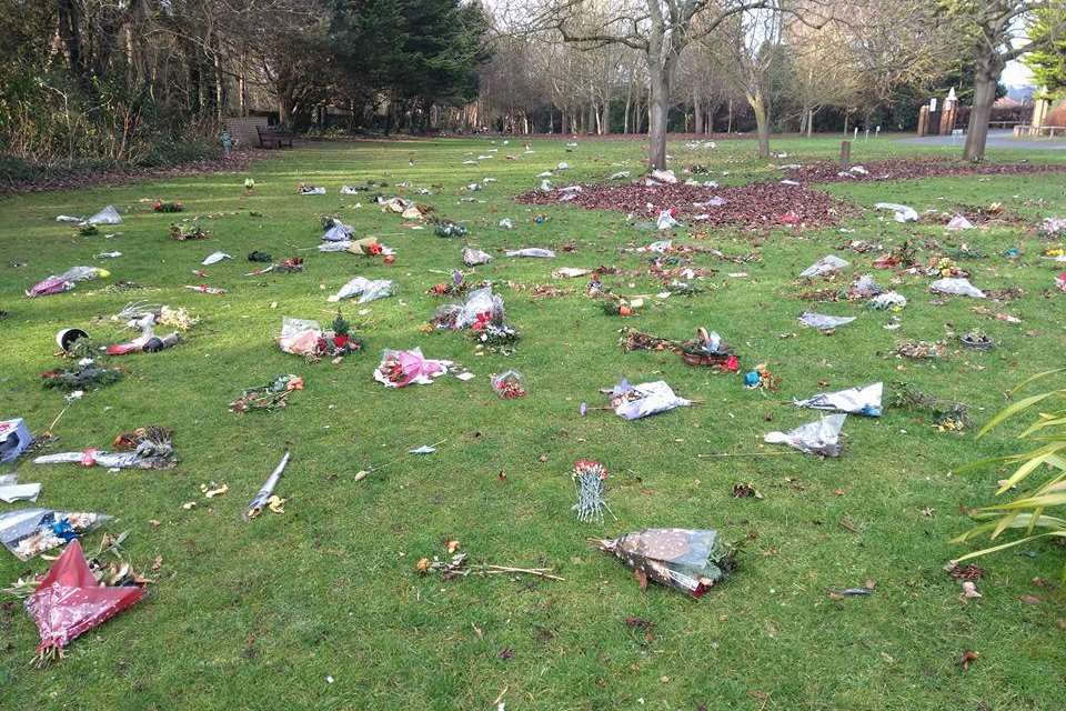 Flowers have been left scattered over the grounds