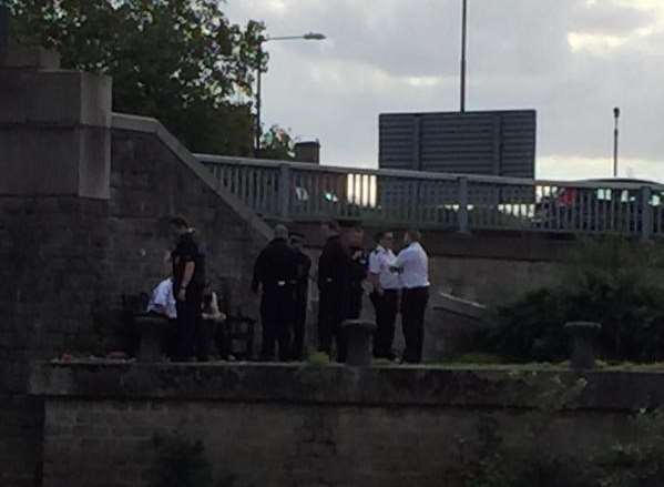 Police stop a man who is thought to have escaped from the Crown Court. Pix: @IAmJarvis
