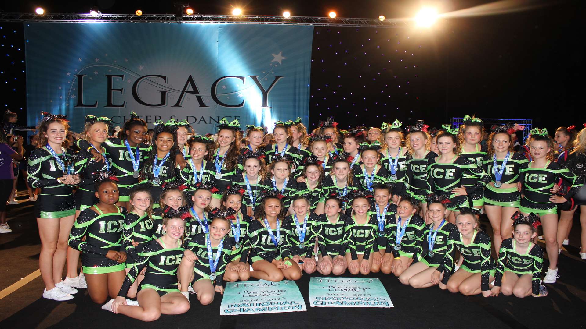 A group shot of teams Fury and Heat, who both took first place in their categories at Legacy Cheer and Dance Nationals