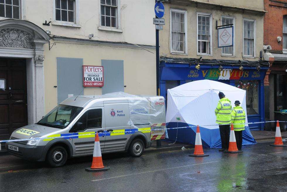 Police investigate the scene in Lower Stone Street