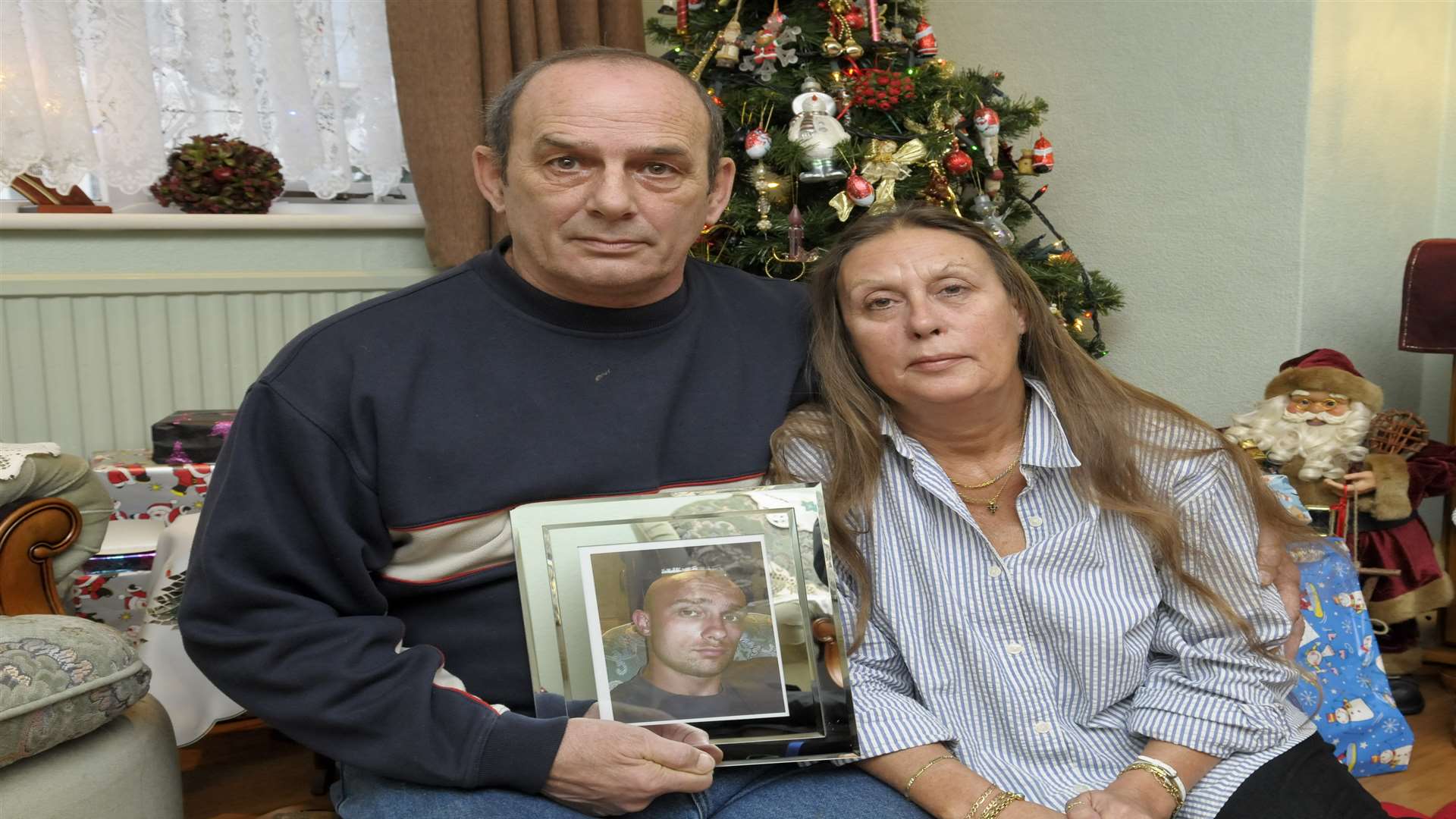 Jim and Pauline Green in their missing son's bedroom at Christmas