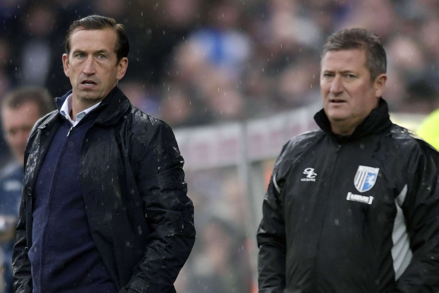 Gills boss Justin Edinburgh and assistant David Kerslake watch on Picture: Barry Goodwin