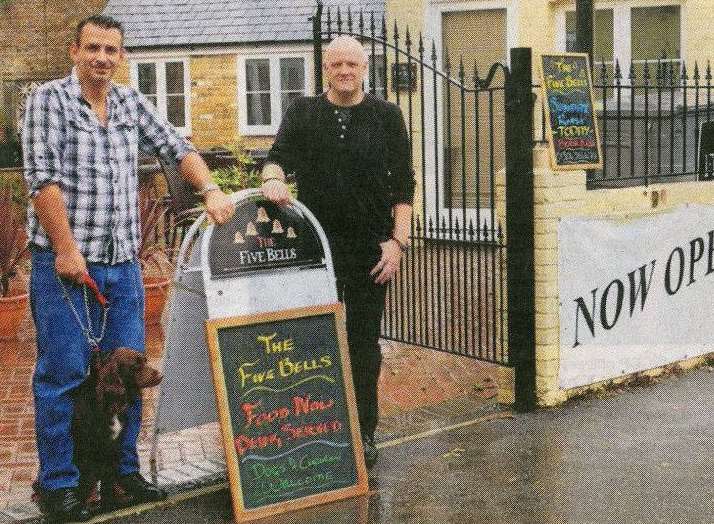 Tony Merrett, with his dog Holly, and partner John Guy outside the Ringwould pub