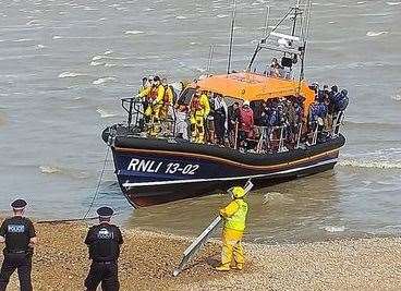 Lifeboat brings ashore people rescued from the Channel at Dungeness