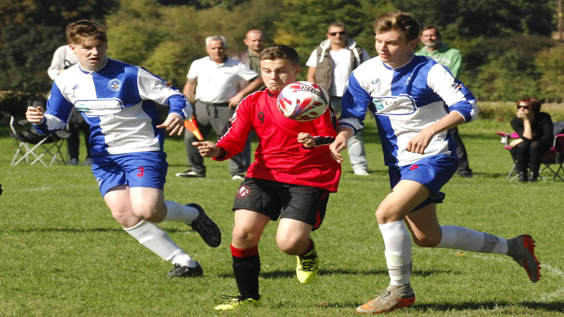 Rainham Kenilworth under-16s, red, in action against Bredhurst Juniors under-16s. Picture: Chris Davey