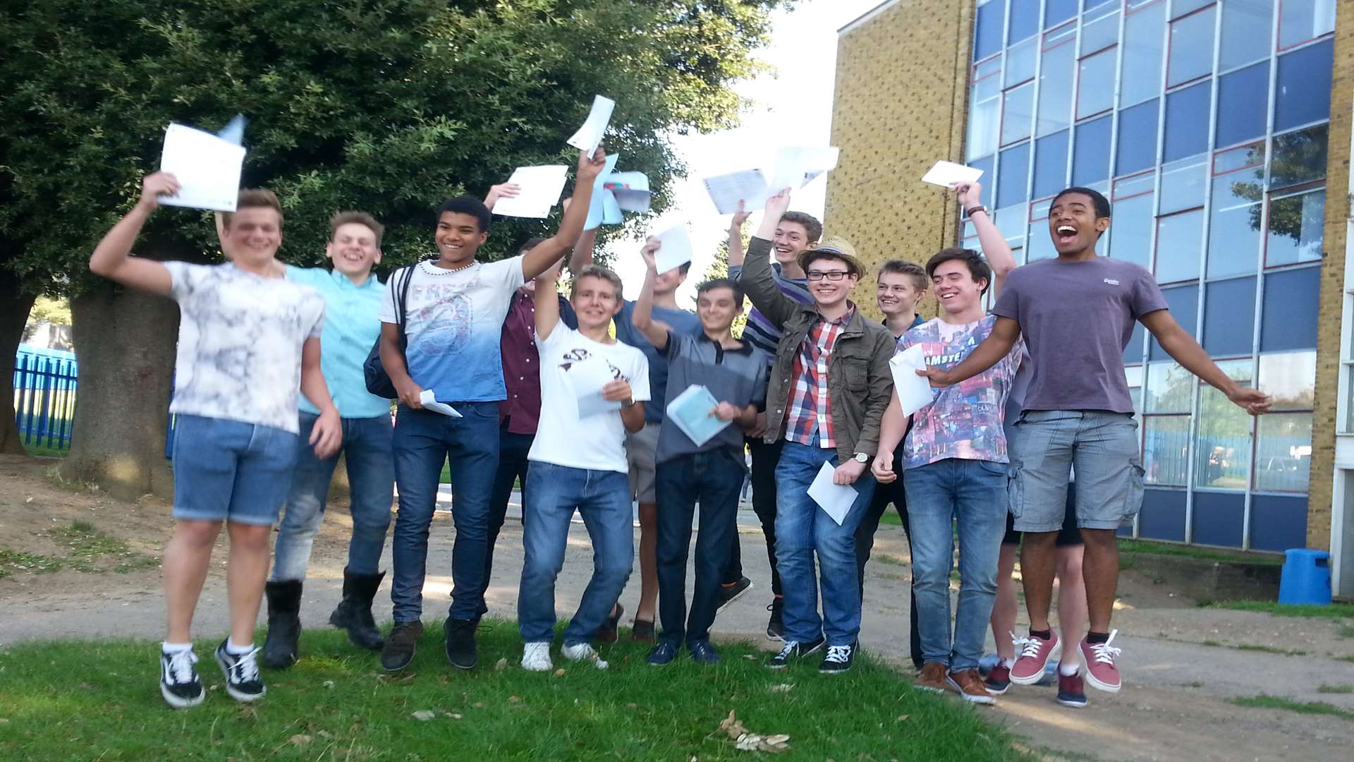 Boys celebrate GCSE results at Oakwood Park Grammar