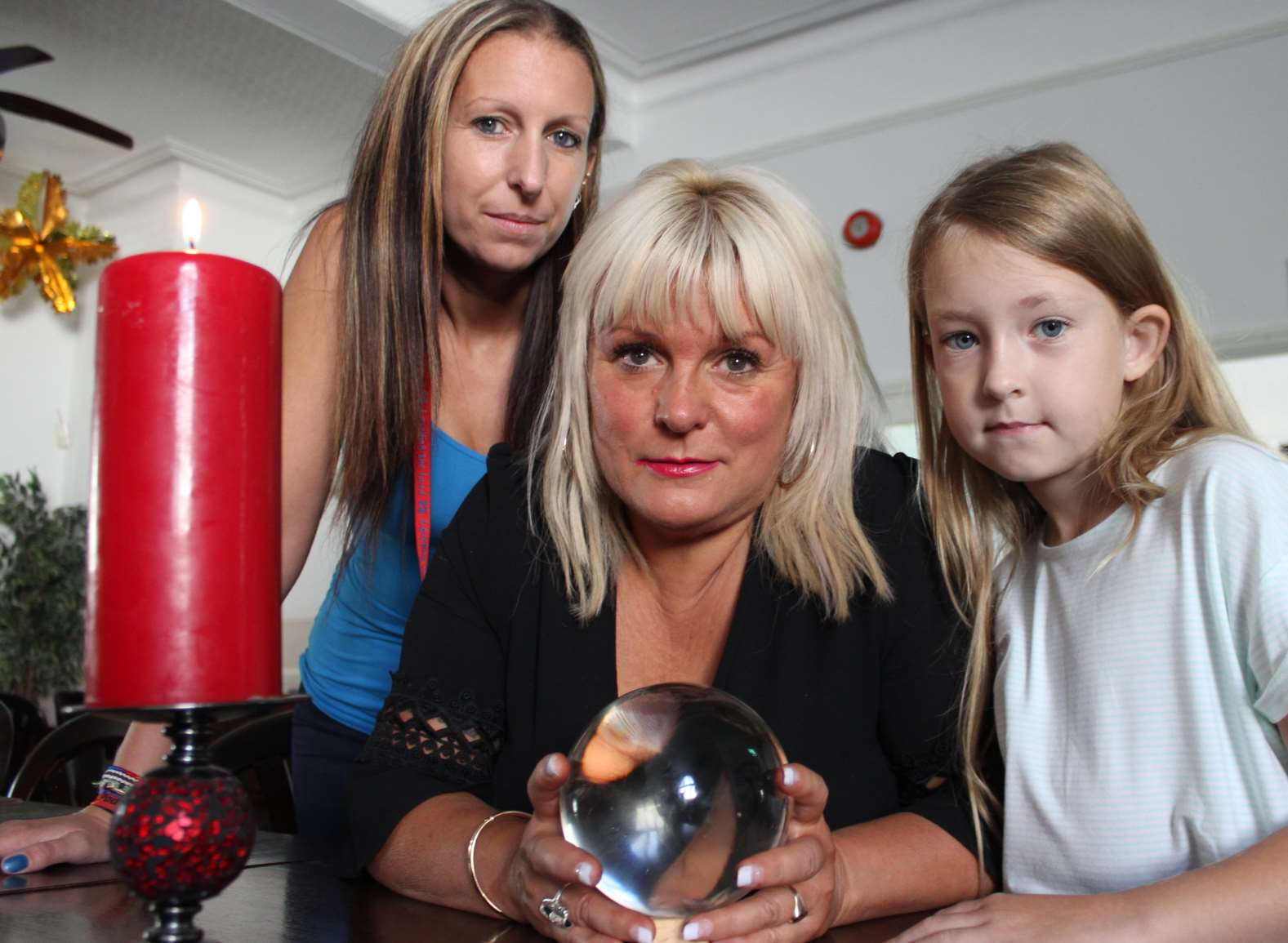 Clairvoyant Charlotte Clark with pub manageress Sarah Lewry and Sarah's daughter Jazmin