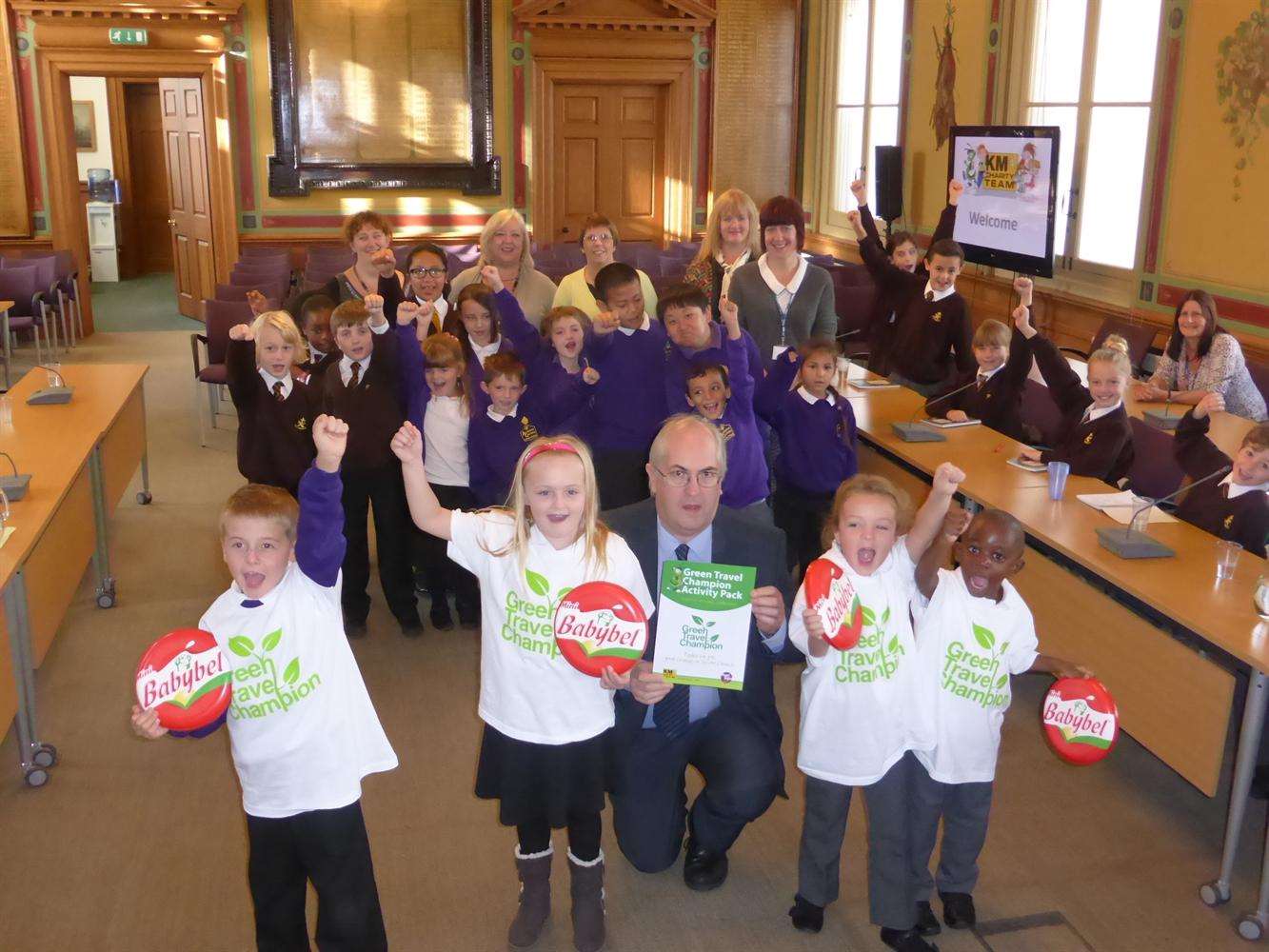 Maidstone Council Environmental Health Manager Steve Wilcock launches the Green Champion scheme supported by Archbishop Courtney pupils David Smith, seven, Jasmine Woodridge, eight, Mya Riddell, six, and Kenan Minta, four, cheered on by school delegates.