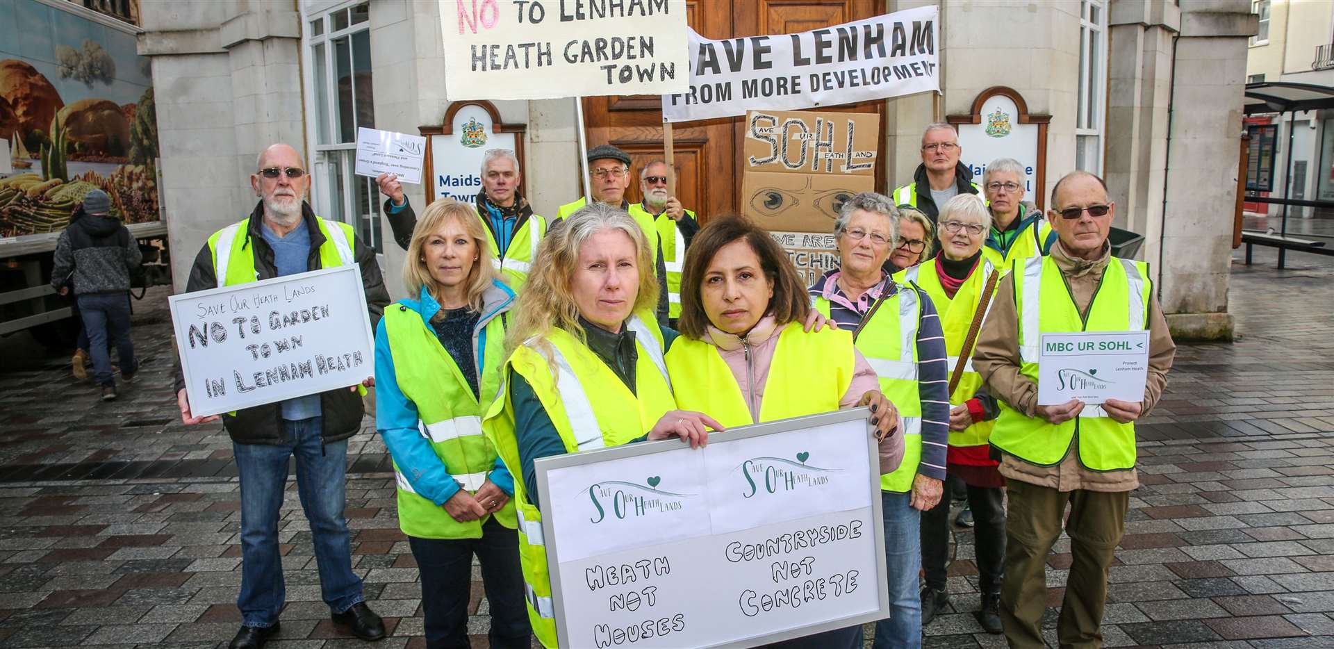 Protest march against MBC's 'Call for Sites' scheme in Lenham. Kate Hammond and Afsaneh Smith with other protestors. Picture: Matthew Walker.