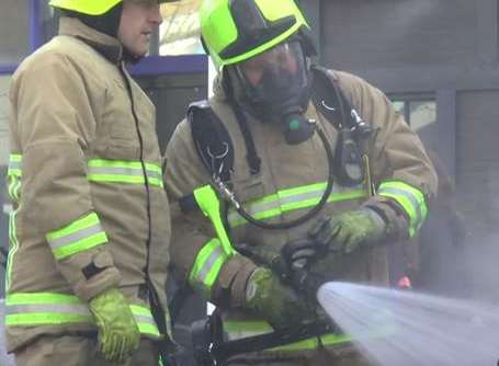 Fire crews wearing breathing gear battled the blaze