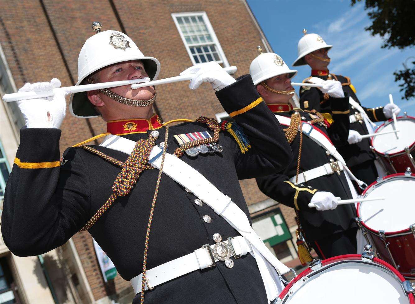 The Royal Marines Band play on the steps of the Town Hall as Mayor of Tunbridge Wells, Councillor Julian Stanyer meets members of Her Majesty's Royal Marines