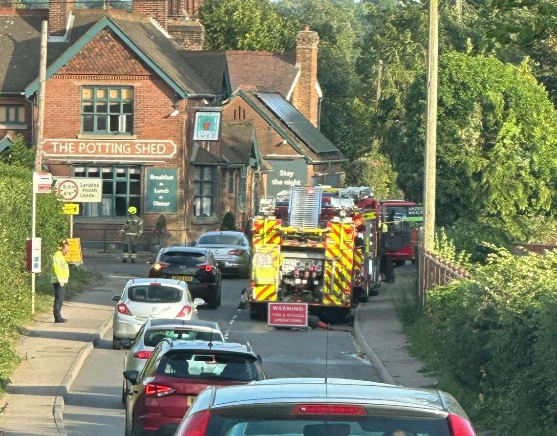 Engines partially blocked the road outside The Potting Shed pub