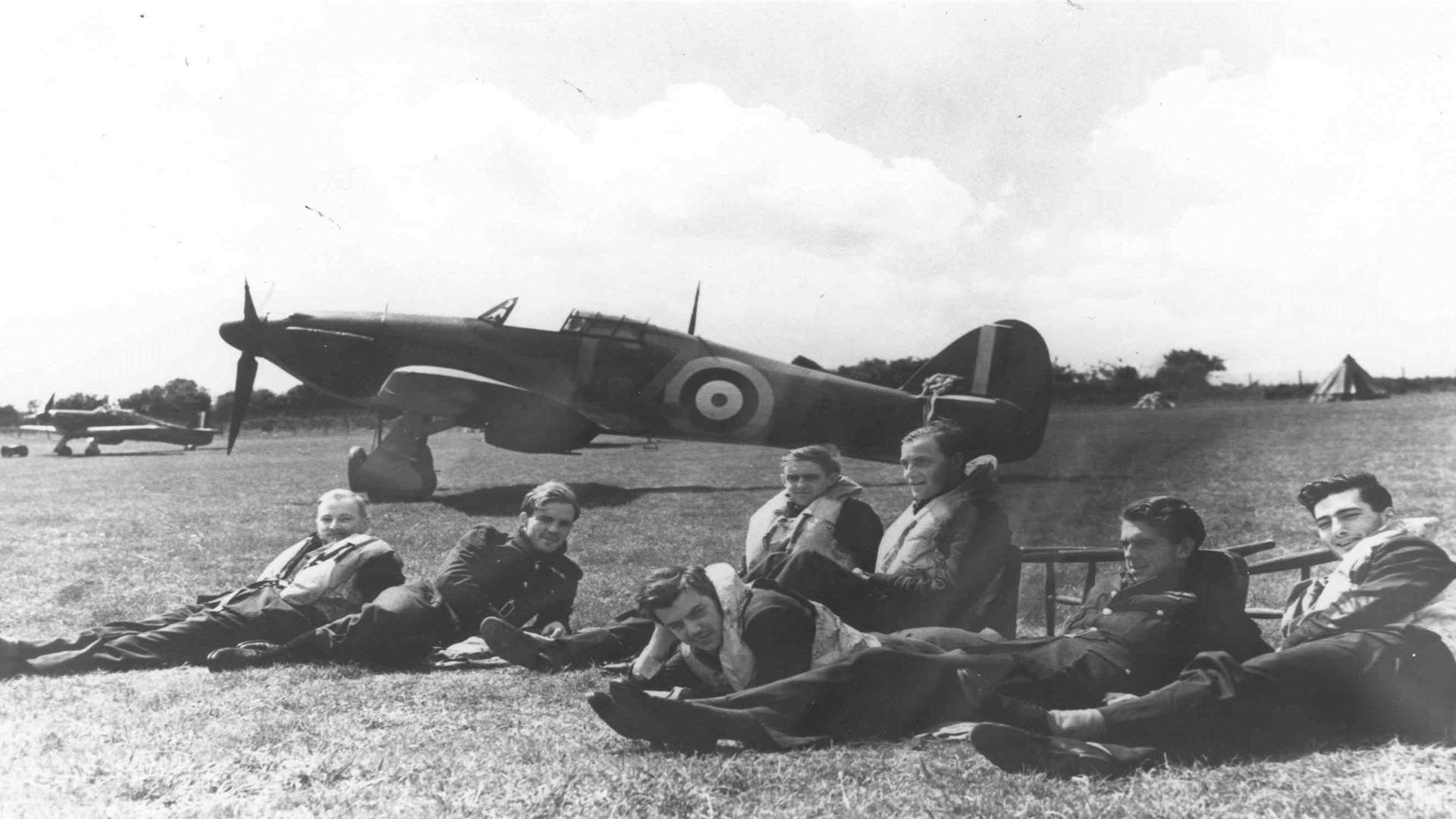Pilots of 32 squadron enjoying a brief respite from action at Hawkinge