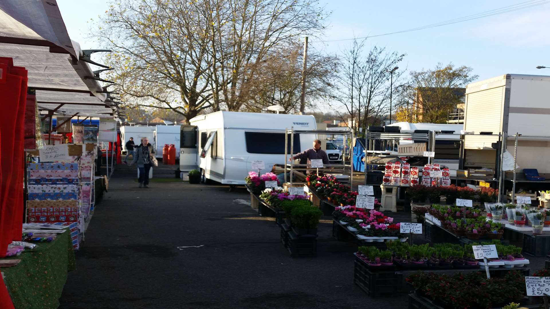 Market traders had to set up their stalls around the caravans.