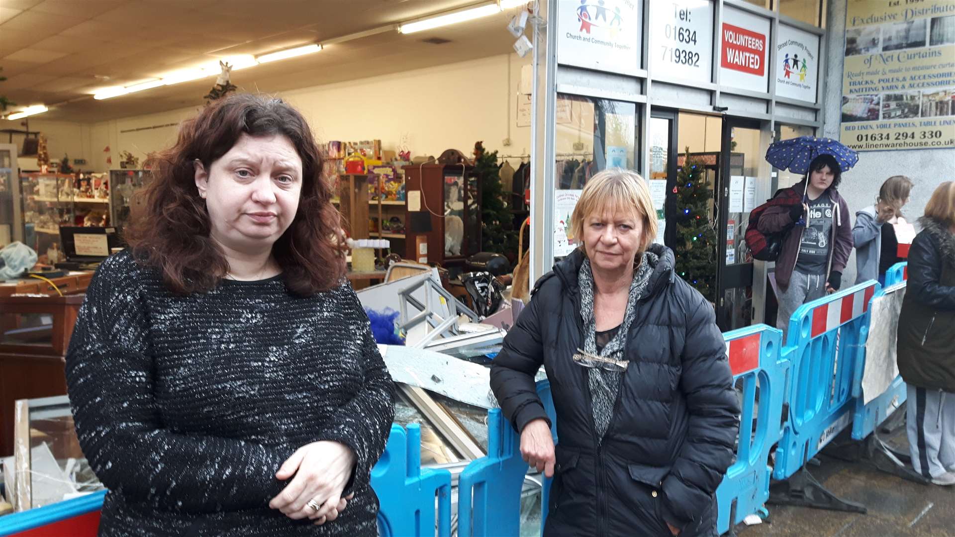 Managers Kim West (right) and Karen Payne outside the smashed shop front