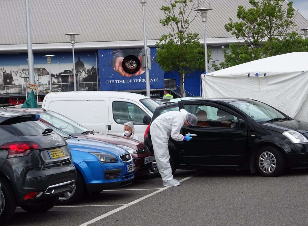 Forensics officers scour through potential evidence. Picture: Tom Smy (@EastKent999vids)