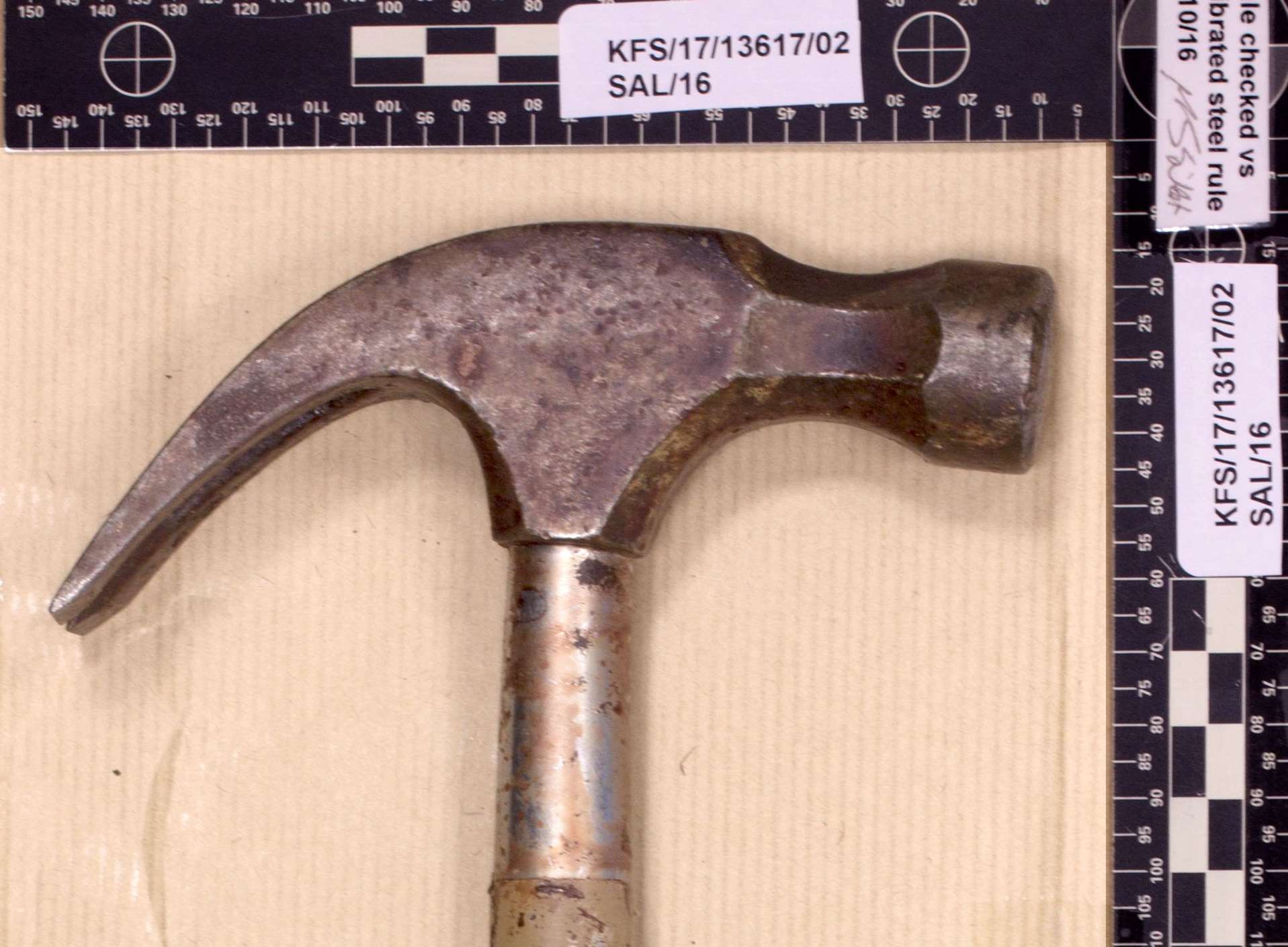 The hammer seized from the scene of the murder
