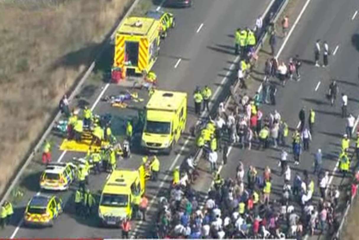 Scores of people are treated by medics on the bridge. Picture: Sky News