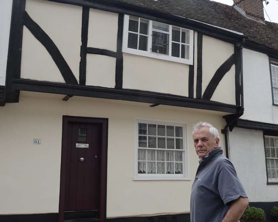 David Gwyn-Jones outside his home in Faversham showing the height from which Rosie fell. Picture: Chris Davey