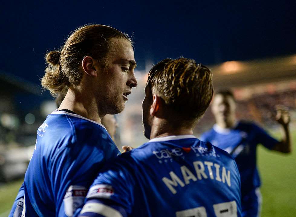 Tom Eaves with Lee Martin after scoring for the Gills Picture: Ady Kerry