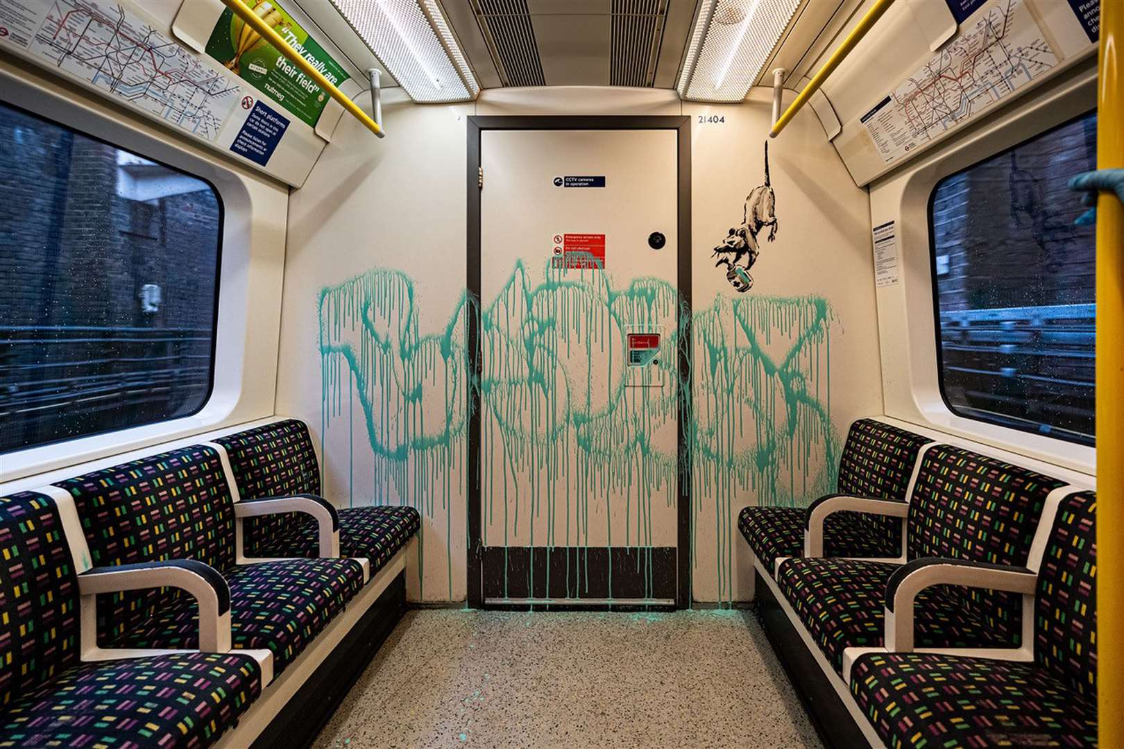 Banksy’s latest work on the inside of a London Underground carriage about the spread of coronavirus (@banksy)