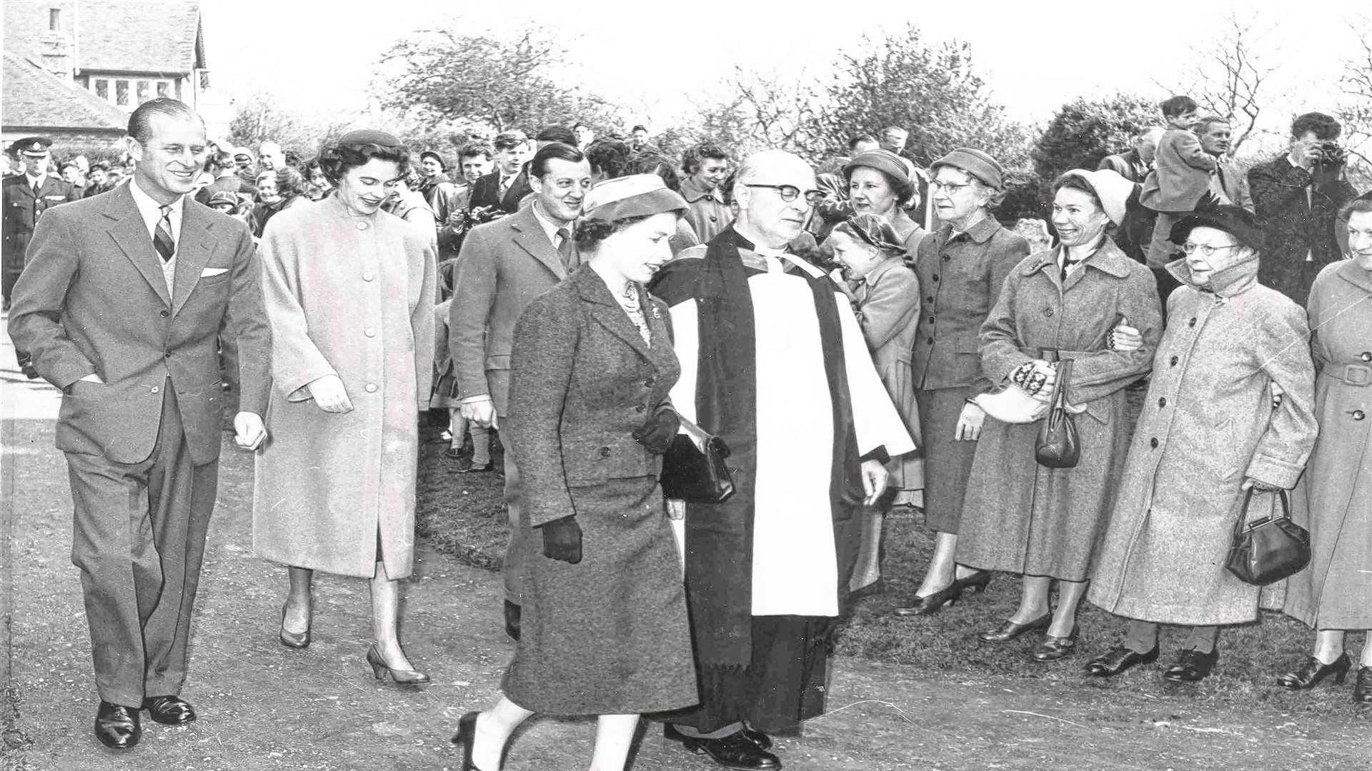 1957 Crowds lined the church approach as Her Majesty The Queen and Prince Phillip joined Lord and Lady Brabourne for a service.