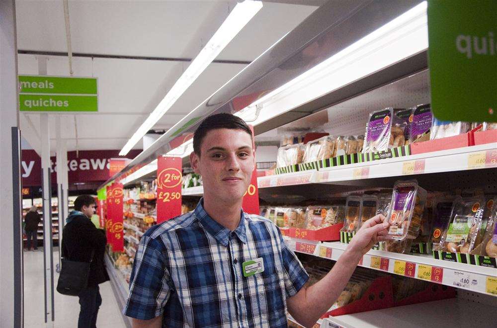 Aaron Borda at work in Asda in Broadstairs where he is working with the Community Life Team, as a result of the supermarket's partnership involvement with homeless charity Porchlight, to provide work experience to people being supported by the charity.