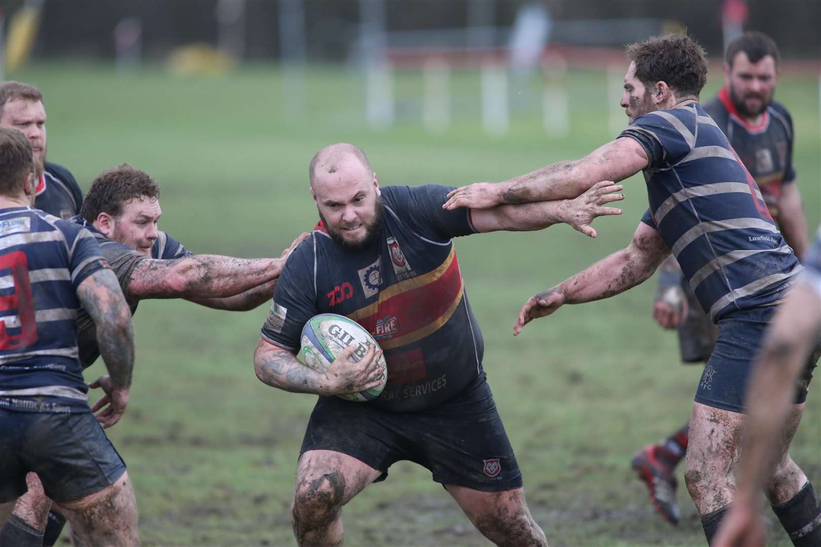 It's time to get down and dirty when the Sheppey Pirates clash with Sheppey Rugby Club players like Dave Rumble, in action here against Westcombe Park. Picture: John Westhrop. (2654292)