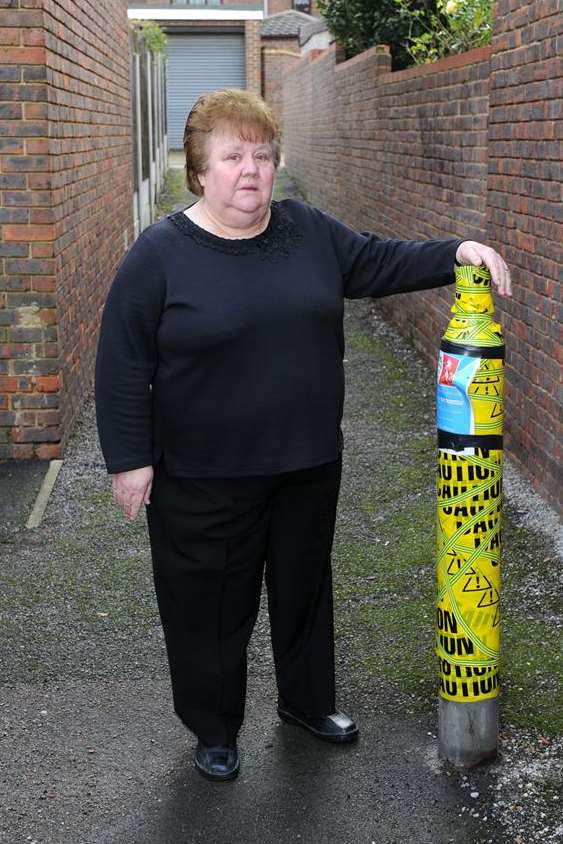 Ann Hudd with one of the missing lampposts