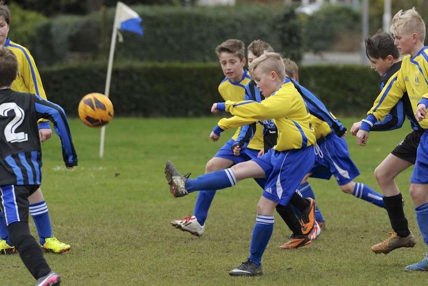 New Road (yellow) and Milton & Fulston Under-12s in John Leeds first round action Picture: Andy Payton